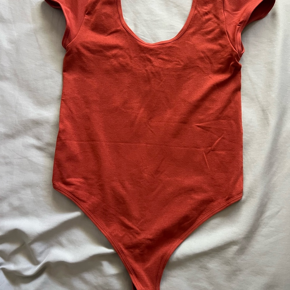 Womens Red One Piece bodysuit